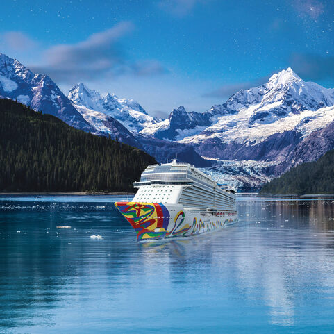Norwegian Encore Cruising through Alaska's Glacier Bay National Park. Johns Hopkins Glacier, summer.